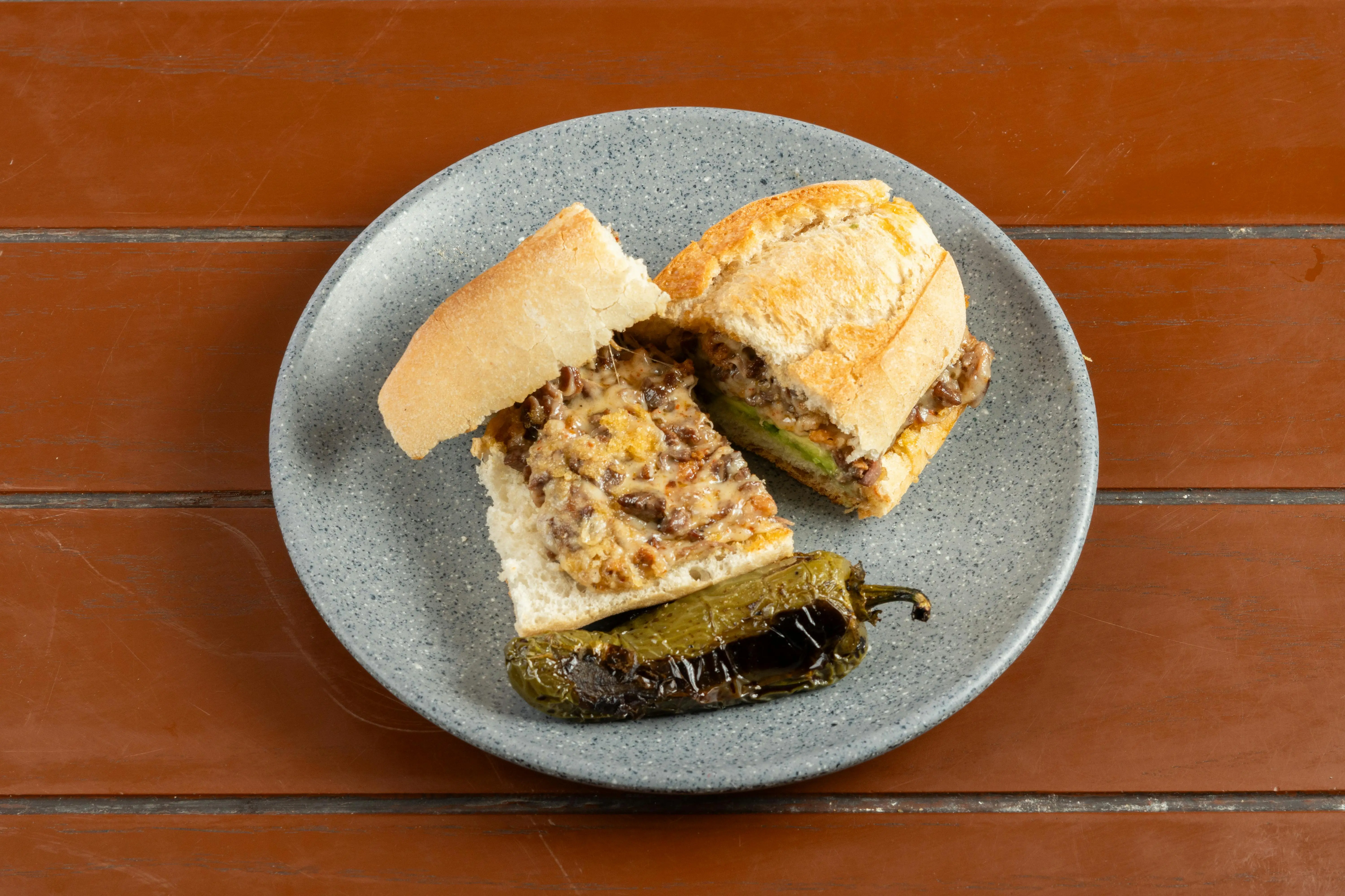 Signature Philly Cheesesteaks at Phat Boy Edmonton North - ribeye steak sandwiches on fresh hoagie rolls